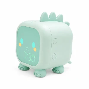 Réveil enfant dragon vert doux avec affichage lumineux sur fond blanc