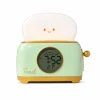Réveil Enfant Toast vert tendre Réveil enfant toast vert tendre sur fond blanc
